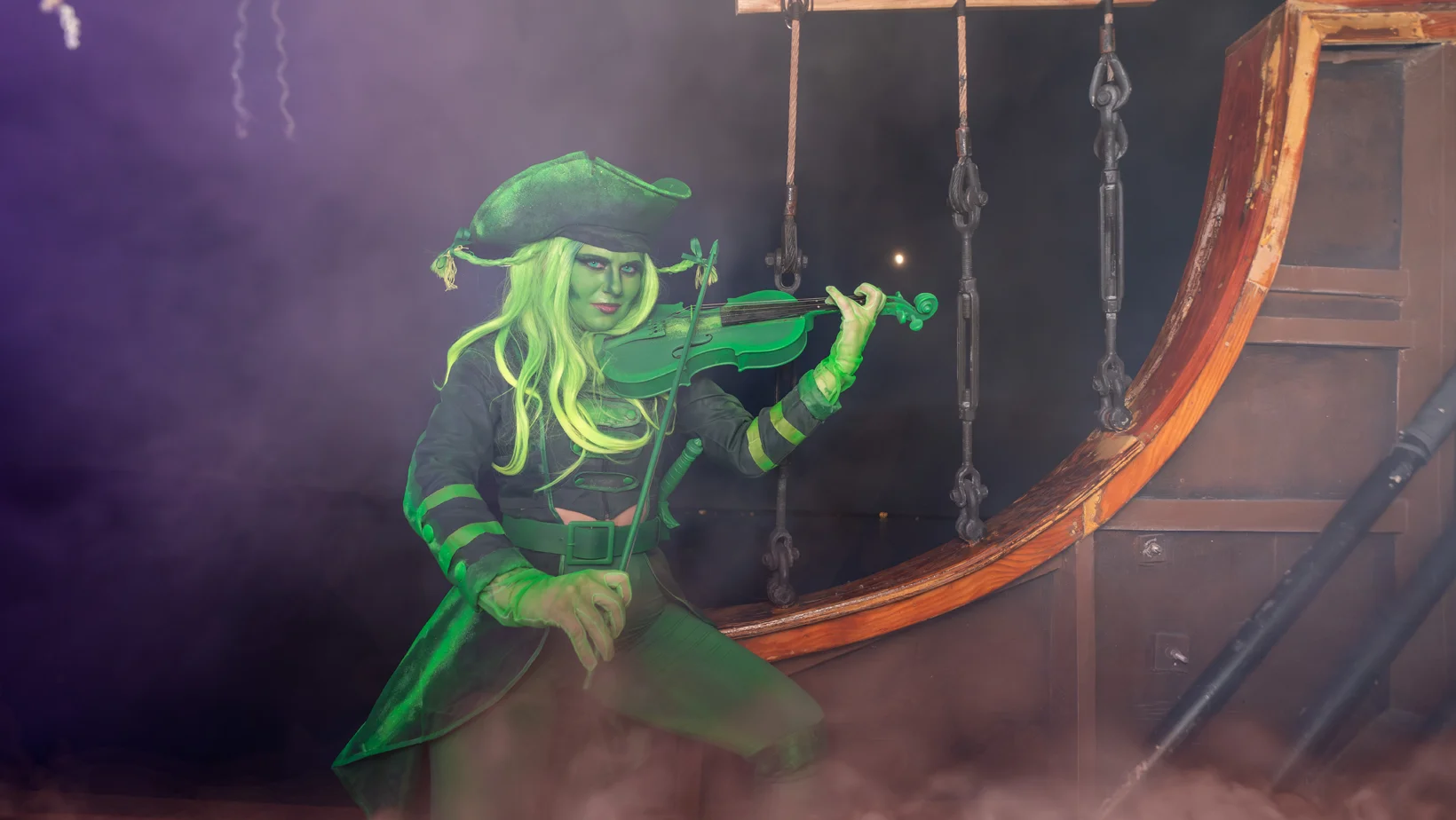 Green Ghost Pirate Cosplayer On A Pirate Boat