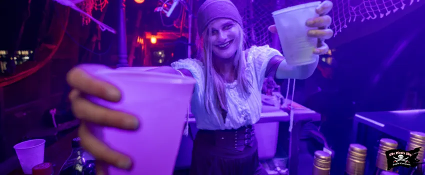 SST - A woman dressed in a pirate costume offering drinks