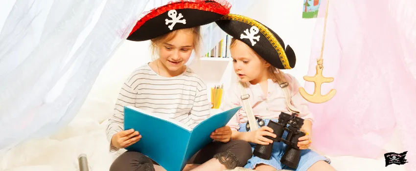 SST - Children in Pirate Costumes Reading a Book