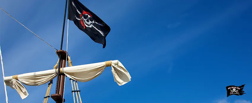 A pirate flag flying on a ships mast