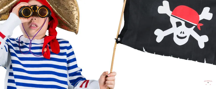 Boy Holding Binocular With Pirate Flag